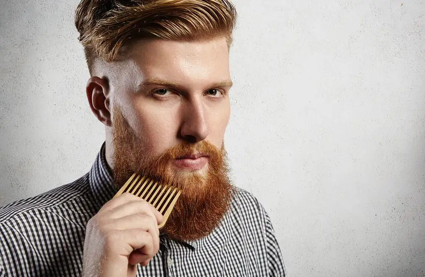 Portrait Of Young Attractive Redhead Hipster Male With Serious A Portrait Of Young Attractive Redhead Hipster Male With Serious A